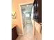 Bathroom featuring a soaking tub, walk in shower with glass enclosure, and tile flooring at 782 Harrington Lake N Dr # 99, Venice, FL 34293