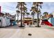 Lively outdoor dining area with food trucks and palm trees at 782 Harrington Lake N Dr # 99, Venice, FL 34293
