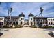 Attractive commercial building with two towers and palm trees in front at 782 Harrington Lake N Dr # 99, Venice, FL 34293