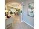 Bright foyer showcasing the open floor plan with views of the dining and living areas at 782 Harrington Lake N Dr # 99, Venice, FL 34293