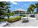 Community pavilion with picnic tables overlooking the water at 782 Harrington Lake N Dr # 99, Venice, FL 34293