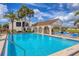 Enjoy a refreshing swim in this sparkling community pool with poolside seating at 820 Capri Isles Blvd # 202, Venice, FL 34292
