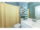 Quaint bathroom with a shower and tub combination, and a single sink vanity at 835 Chalmers Dr # 835, Venice, FL 34293