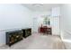 Bright bedroom with two closets, neutral carpet, and an expansive window view at 835 Chalmers Dr # 835, Venice, FL 34293