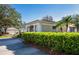 A well-maintained home with beautiful landscaping, offering a picturesque view and inviting curb appeal for relaxed living at 835 Chalmers Dr # 835, Venice, FL 34293