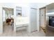Kitchen area with desk nook, storage and passthrough to other rooms at 835 Chalmers Dr # 835, Venice, FL 34293
