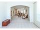 Spacious living area with open layout to the dining room, and neutral color palette at 835 Chalmers Dr # 835, Venice, FL 34293