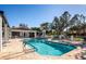 Enjoy a refreshing dip in this beautiful community pool, surrounded by lush landscaping and comfortable lounge areas at 835 Chalmers Dr # 835, Venice, FL 34293