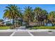 Entrance to Venice Beach with palm trees, a stone facade, and easy access to the beach at 835 Chalmers Dr # 835, Venice, FL 34293