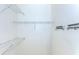 Spacious walk-in closet with wire shelving for optimal organization at 835 Chalmers Dr # 835, Venice, FL 34293