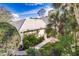 Gorgeous home with lush landscaping, mature palms and a welcoming walkway at 921 Tartan Dr # 31, Venice, FL 34293