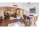 Open living room with hardwood floors, ceiling fan, modern furniture, and a cozy atmosphere at 921 Tartan Dr # 31, Venice, FL 34293