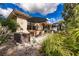 The home has a private patio space surrounded by tropical landscaping at 921 Tartan Dr # 31, Venice, FL 34293