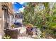 Charming patio with comfortable seating and lush surroundings; perfect for enjoying the outdoors at 921 Tartan Dr # 31, Venice, FL 34293