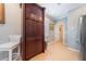Well-organized kitchen features a dark pantry and is complemented by tiled floors at 9839 Nostalgia Pl, Englewood, FL 34223