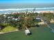 Waterfront home with boat dock, offering direct access to the Gulf at 1049 N Casey Key Rd, Osprey, FL 34229