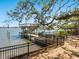 Private boat dock on the waterfront, providing direct access to the water for boating and recreation at 1049 N Casey Key Rd, Osprey, FL 34229
