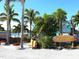 Well landscaped exterior featuring signs for kayak rentals and a waterfront restaurant at 1049 N Casey Key Rd, Osprey, FL 34229