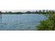 Water view overlooking bay with lush greenery and waterfront home at 1049 N Casey Key Rd, Osprey, FL 34229