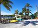 Waterfront area featuring boat docks, colorful buildings, and scenic views at 1049 N Casey Key Rd, Osprey, FL 34229