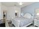 Bedroom offers a walk-in closet and access to the hallway at 10797 Tarflower Dr # 202, Venice, FL 34293