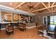 Spacious coffee bar area with wood floors, coffee themed art, and a high ceiling at 10797 Tarflower Dr # 202, Venice, FL 34293