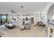 Open-concept living space integrates the living room, kitchen, and dining area for seamless living at 10797 Tarflower Dr # 202, Venice, FL 34293