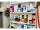 Organized pantry shelving holding food and household supplies at 10797 Tarflower Dr # 202, Venice, FL 34293
