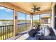 Relax on the screened patio with scenic lake views and comfortable seating at 10797 Tarflower Dr # 202, Venice, FL 34293