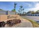 Bellagio community entrance with lush landscaping at 108 Corte Del Asolo, Venice, FL 34285