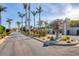 Bellagio community entrance with lush landscaping and fountain at 108 Corte Del Asolo, Venice, FL 34285