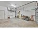 Spacious garage with ample storage, and concrete flooring at 108 Corte Del Asolo, Venice, FL 34285