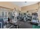 Well-equipped gym with various exercise machines and weights for a complete workout at 108 Corte Del Asolo, Venice, FL 34285