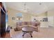 Open concept living space with tile floors and recessed lighting, adjacent to kitchen at 108 Corte Del Asolo, Venice, FL 34285