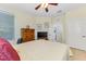 Bedroom featuring a ceiling fan, window, and tiled floors at 11157 Batello Dr, Venice, FL 34292