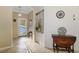 Inviting foyer with tile flooring, decorative lighting, and elegant decor at 11157 Batello Dr, Venice, FL 34292