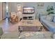 Comfortable living room with lots of natural light and neutral color scheme at 117 Altesino Ct, Venice, FL 34292