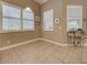 This breakfast nook features bright natural light and neutral color scheme at 117 Altesino Ct, Venice, FL 34292