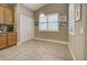The kitchen nook is bright with natural light, a pantry, and simple decor at 117 Altesino Ct, Venice, FL 34292