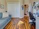 Bright office with hardwood floors, closet space, and a comfortable couch for lounging at 117 Altesino Ct, Venice, FL 34292