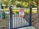 Designated pet area gate with signage for residents only at 117 Altesino Ct, Venice, FL 34292