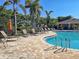 Inviting community pool with ample lounging and nearby shady spots at 117 Altesino Ct, Venice, FL 34292