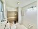 In-progress bathroom with updated fixtures offers potential for customization at 1170 Little Ct, Englewood, FL 34223