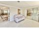 Open living space with bright light, neutral paint, and doorways to other rooms at 1170 Little Ct, Englewood, FL 34223