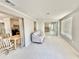 Bright living area with lots of light, doorways into other rooms, and neutral walls at 1170 Little Ct, Englewood, FL 34223