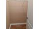 Small closet with a clothing rod and wood-look vinyl flooring at 1204 L Pavia Blvd # 1204, Venice, FL 34292