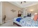 Comfortable bedroom with walk-in closet and ensuite bath access at 12127 Granite Woods Loop, Venice, FL 34292