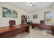 A spacious office with two desks, tile flooring, and neutral paint at 12127 Granite Woods Loop, Venice, FL 34292