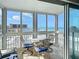 A bright sunroom with beautiful ocean views and outdoor seating area at 1255 Tarpon Center Dr # 503, Venice, FL 34285