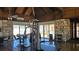 Recreation center gym featuring exercise equipment, table, and open space for various activities at 13534 Alberta Ave, Port Charlotte, FL 33981